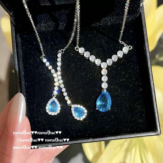 Comet Maria Sapphire Droplet Necklace: a rich girl with 18K gold plated teardrop zircon Y-shaped necklace.