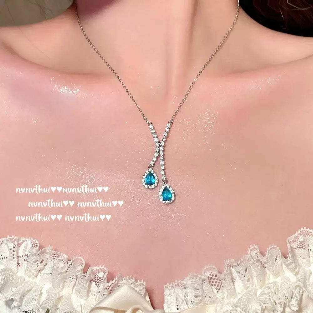 Comet Maria Sapphire Droplet Necklace: a rich girl with 18K gold plated teardrop zircon Y-shaped necklace.