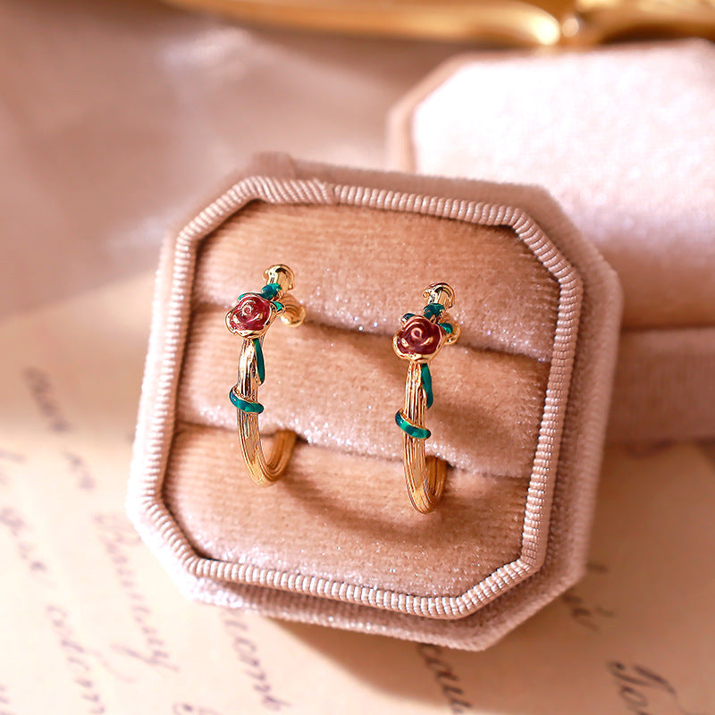 New enamel earrings with rose relief shape, personalized retro earrings, light luxury style, French high-end earrings