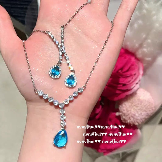 Comet Maria Sapphire Droplet Necklace: a rich girl with 18K gold plated teardrop zircon Y-shaped necklace.