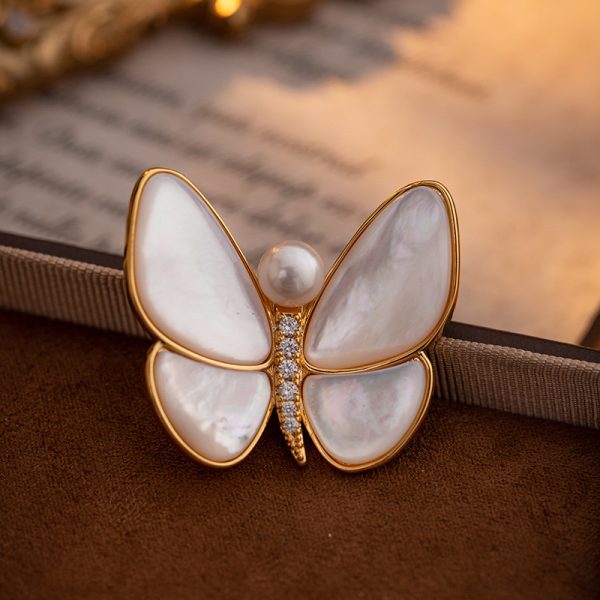 vintage pearl style butterfly brooch