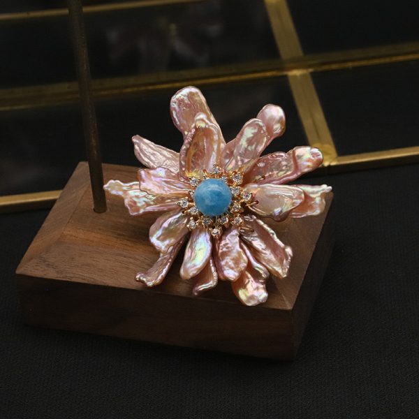 baroque luxury flowers brooch with blue gemstone